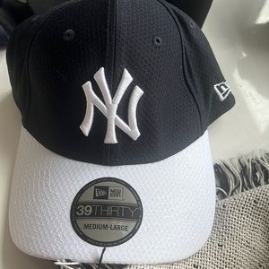 Navy and white Yankees hat